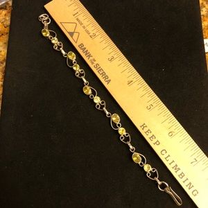 Yellow stones and silver bracelet