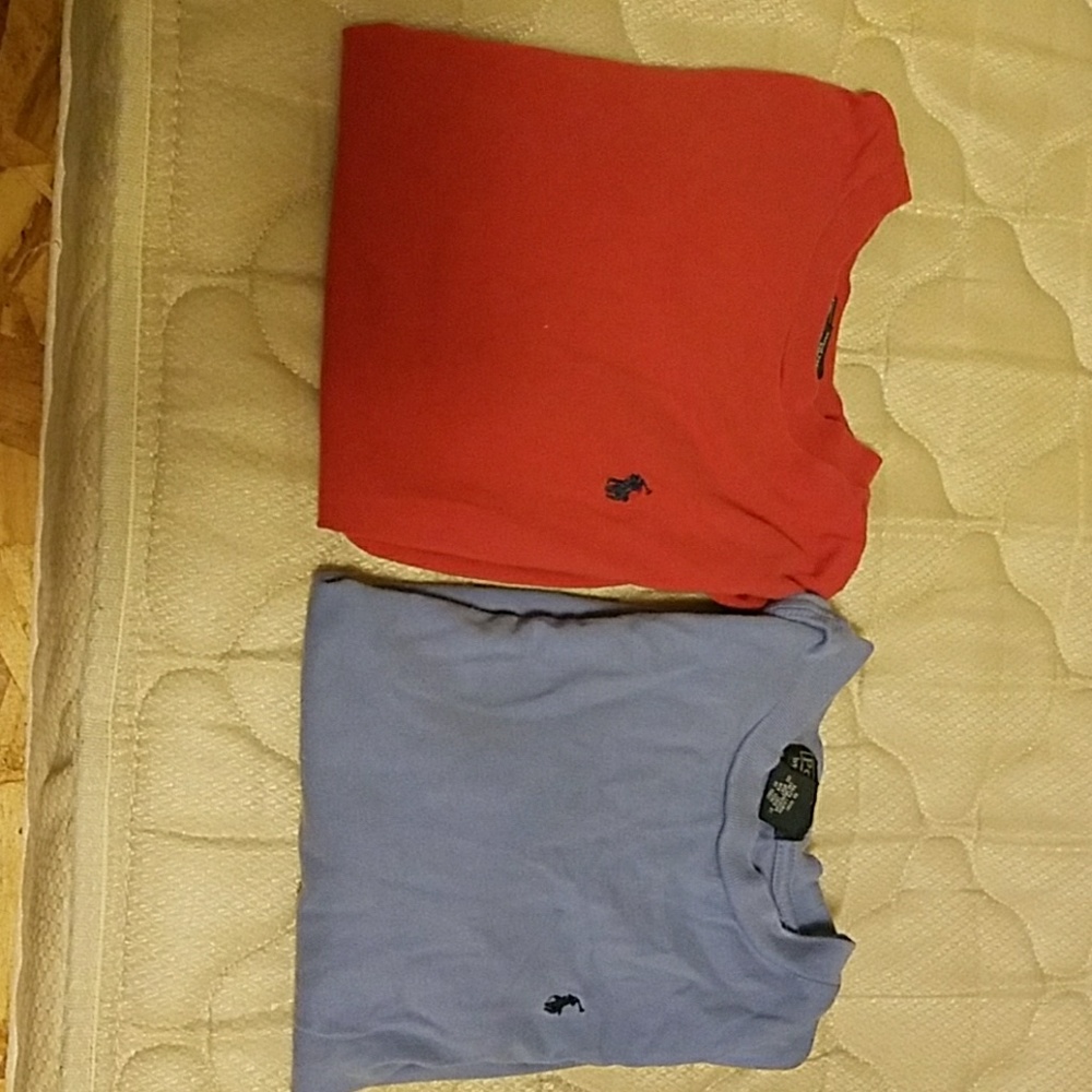 Two boys long sleeve polo shirts.