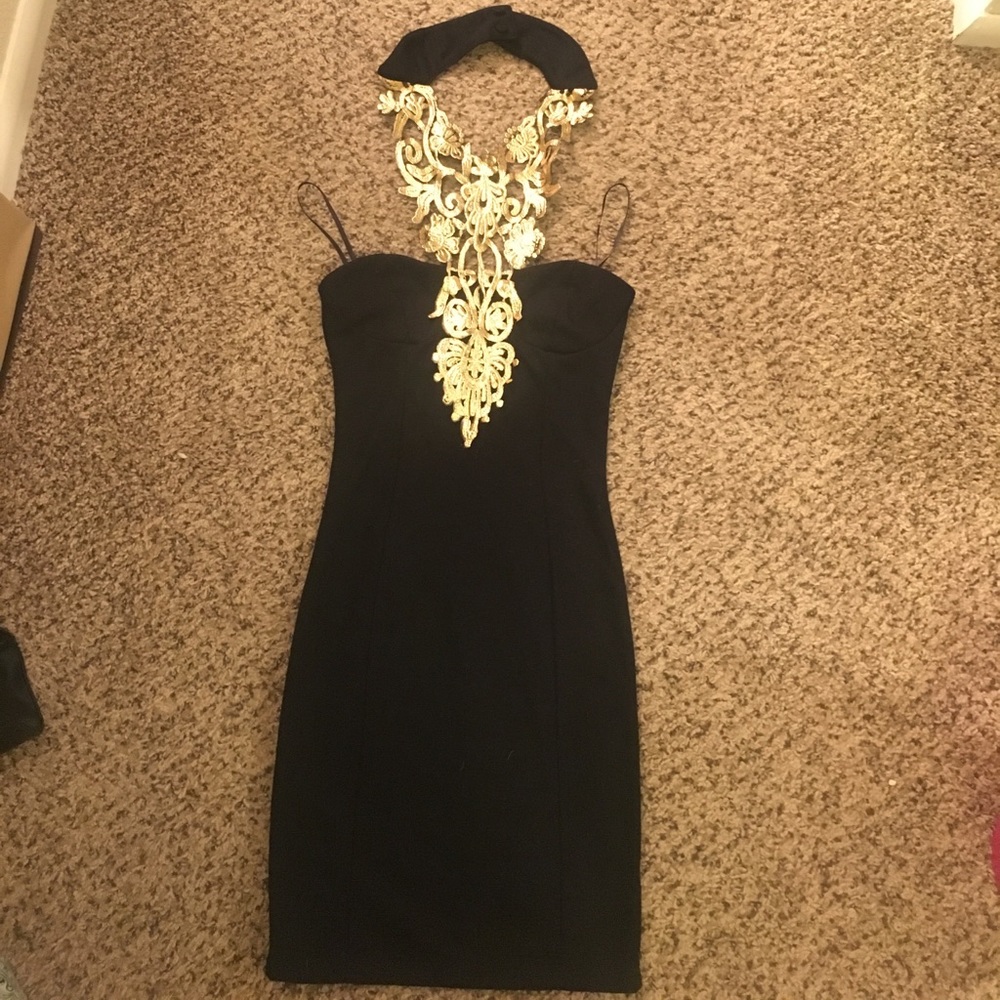 Paprika black mini dress gold metallic halter.