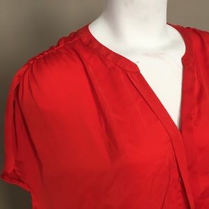 Silk red blouse with hidden buttons