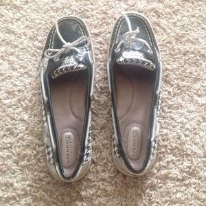 Black and white sperry shoes