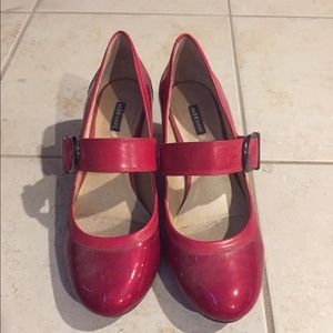 Hardly worn red pumps