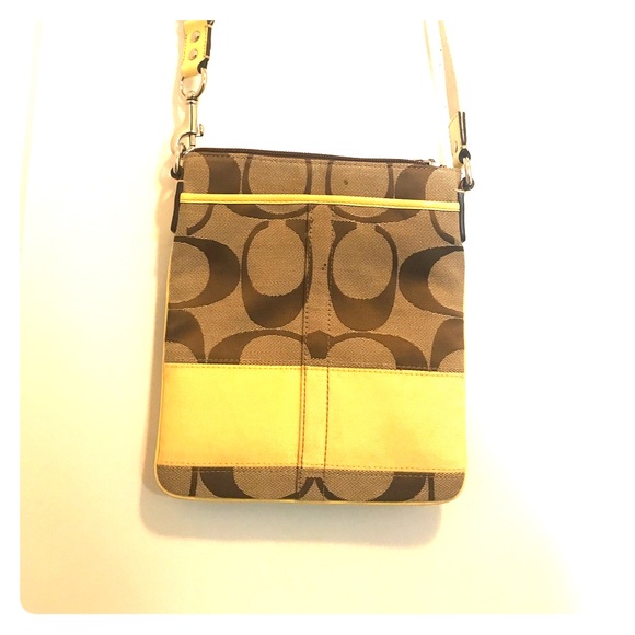 small yellow coach purse