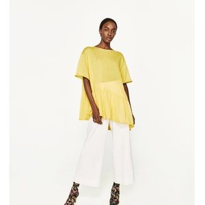 Vibrant asymmetrical top with ruffles
