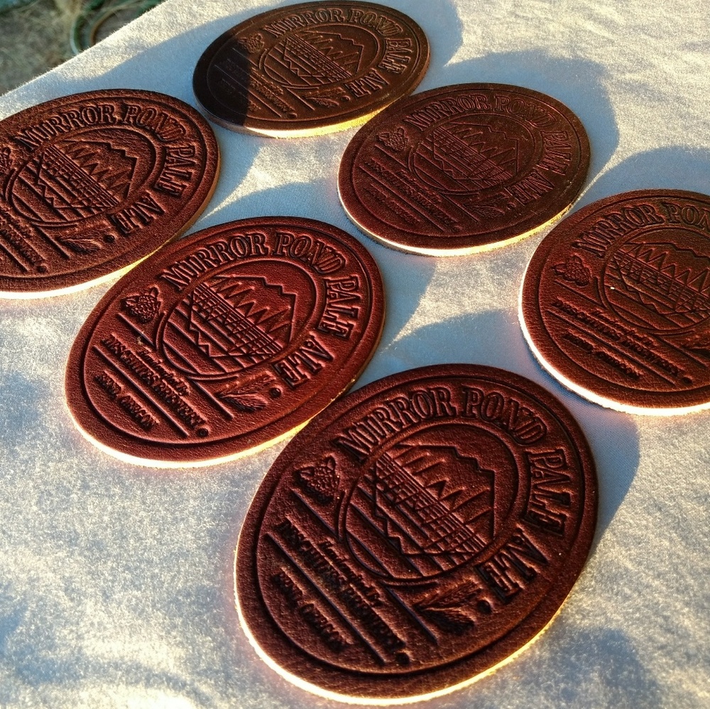 Vintage Deschutte Brewery leather coasters