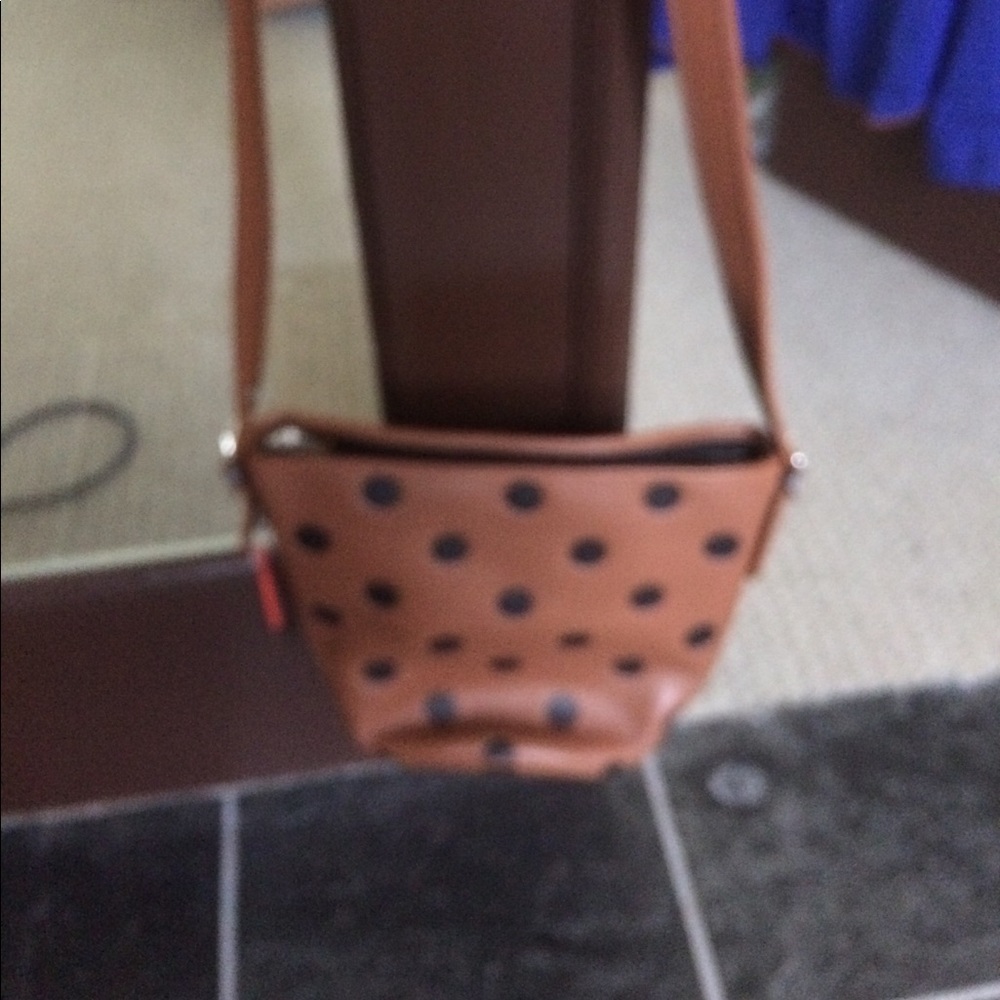 Small coach bucket bag