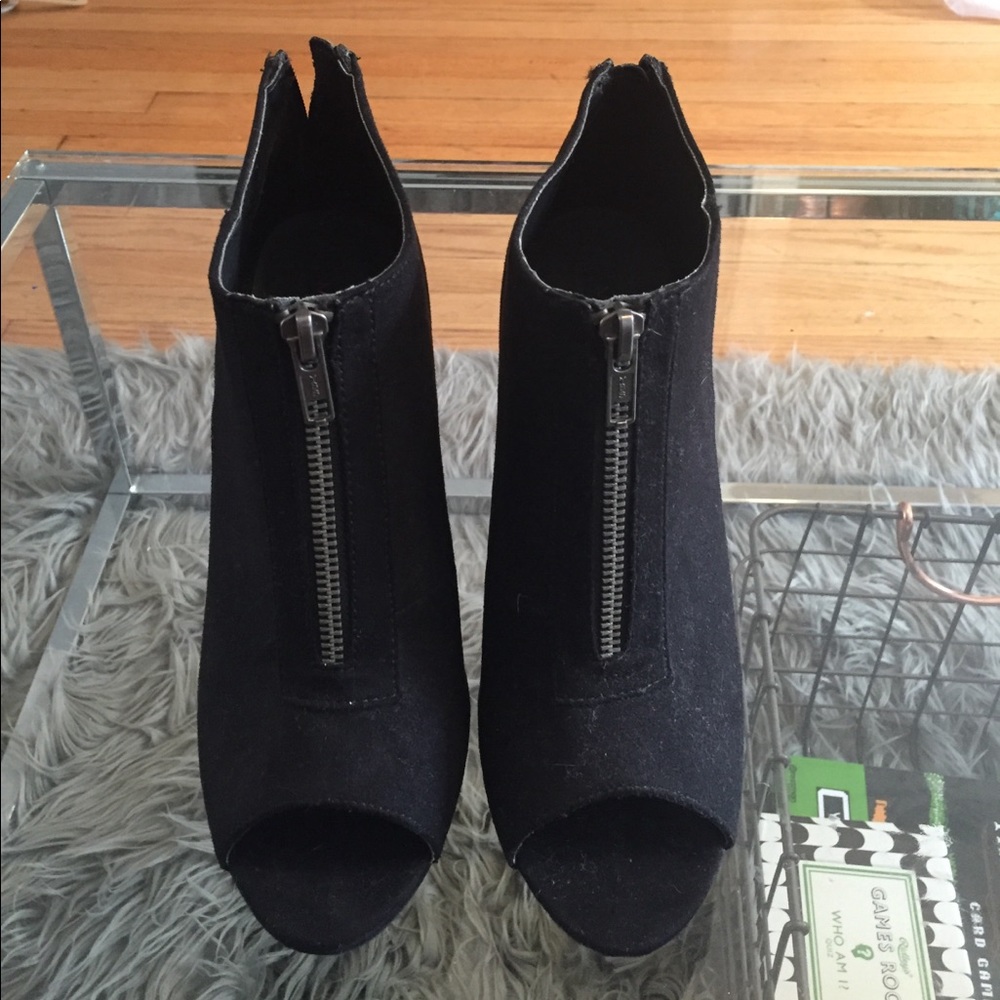 Peep toed booties.