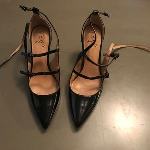 Strappy black patent heels