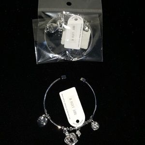 Small silver tone charm bracelet