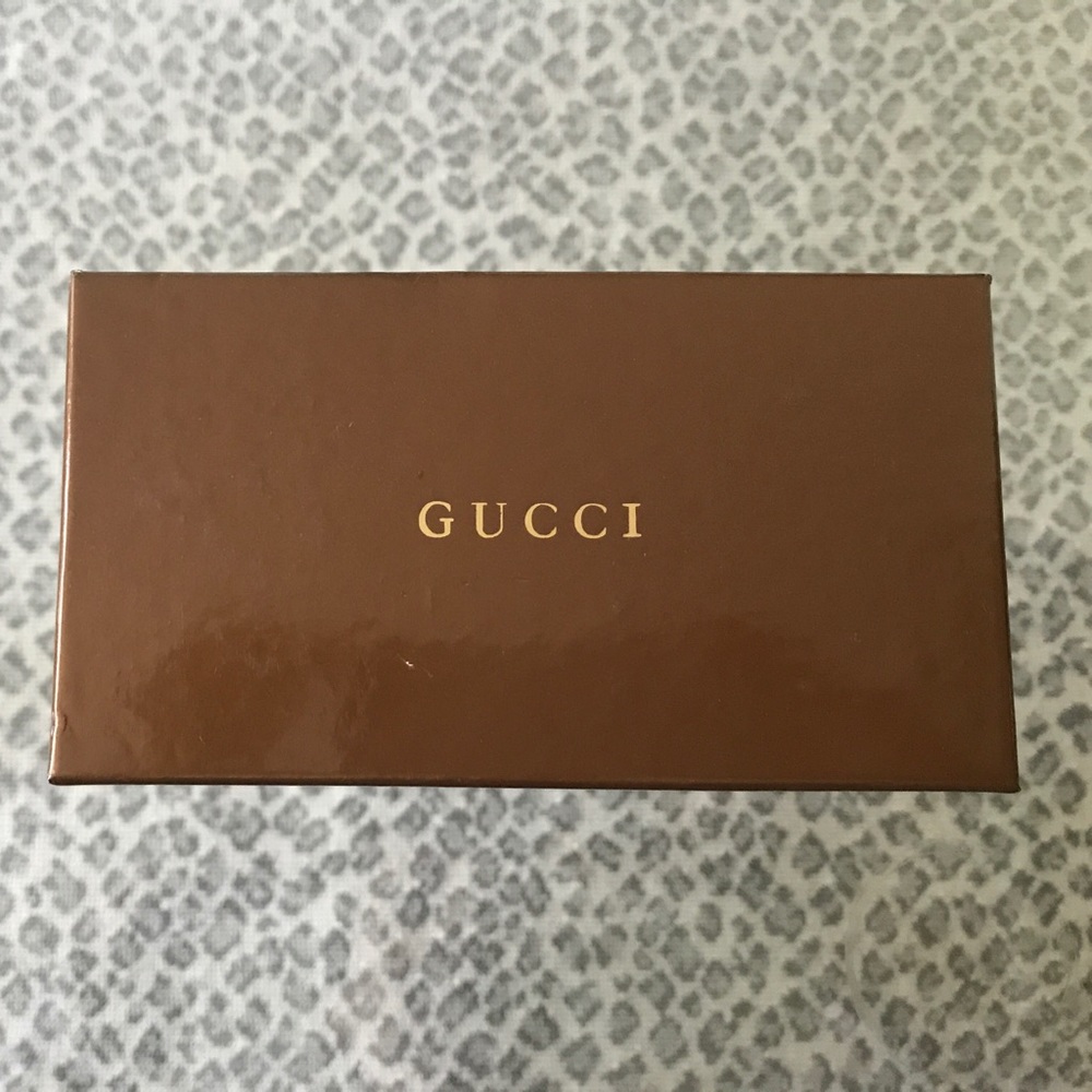 Pair of new Gucci sunglasses.  Never worn.