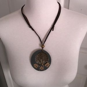 Tree of life necklace with wooden medallion.