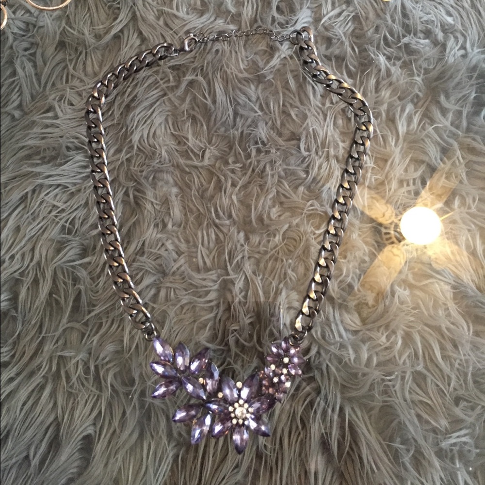 Purple jeweled flowers with dark metal chain