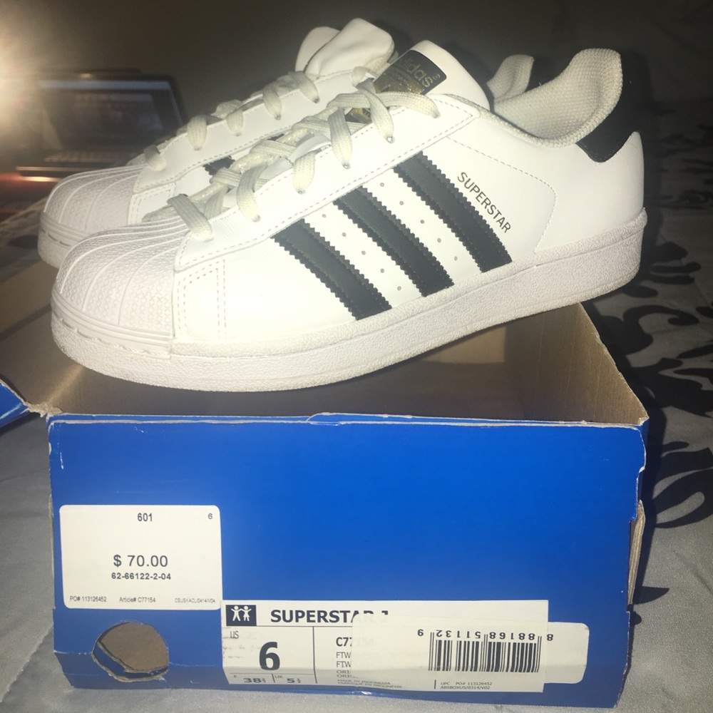 White with black stripes adidas super star