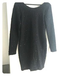 Jennifer Lopez black sequined dress. Jennifer Lopez black sequined dress.