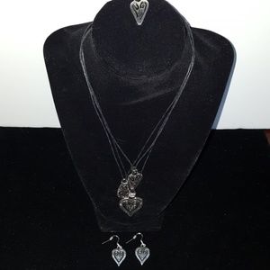 Silver and leatherette necklace and earring set