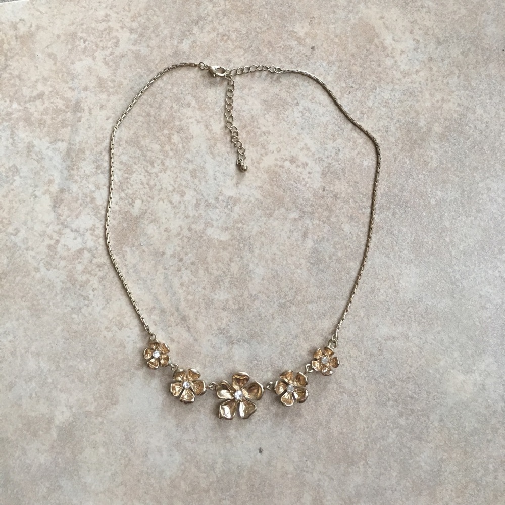 Gold flower necklace with stones