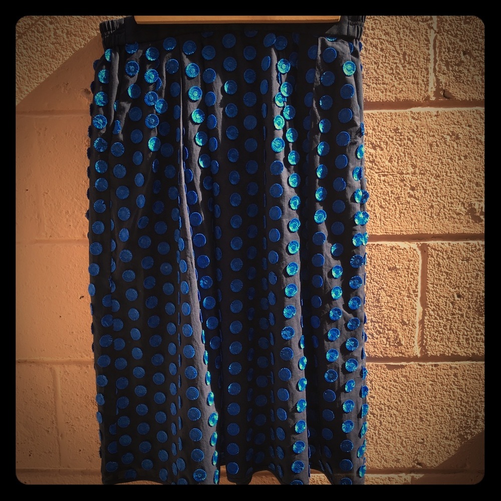 Navy blue skirt with bright blue polka dots