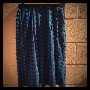 Navy blue skirt with bright blue polka dots