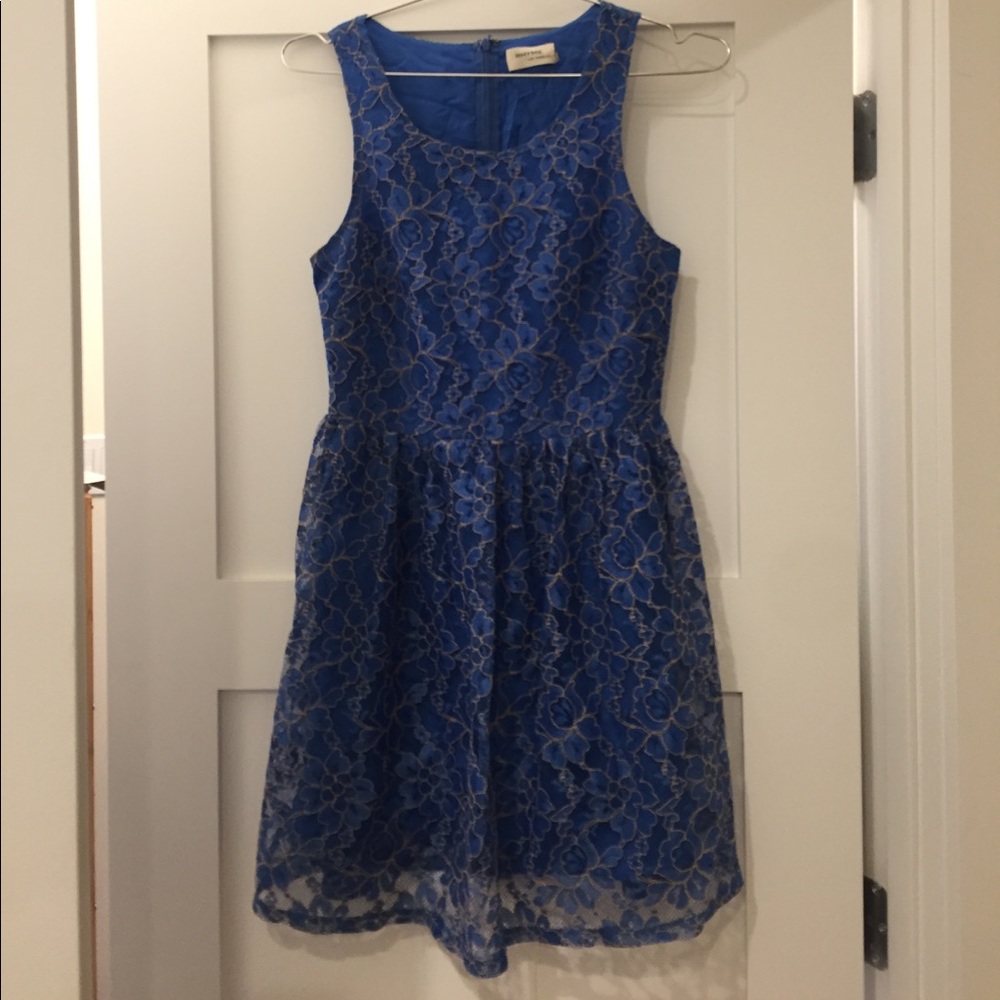 Blue lace dress with gold detail