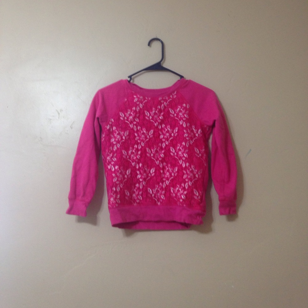 A super cute hot pink sweater!