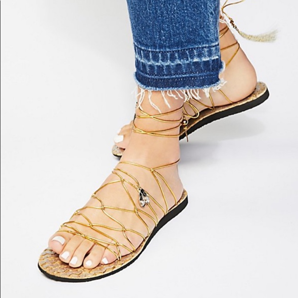Free people lace up gladiator type gold sandals