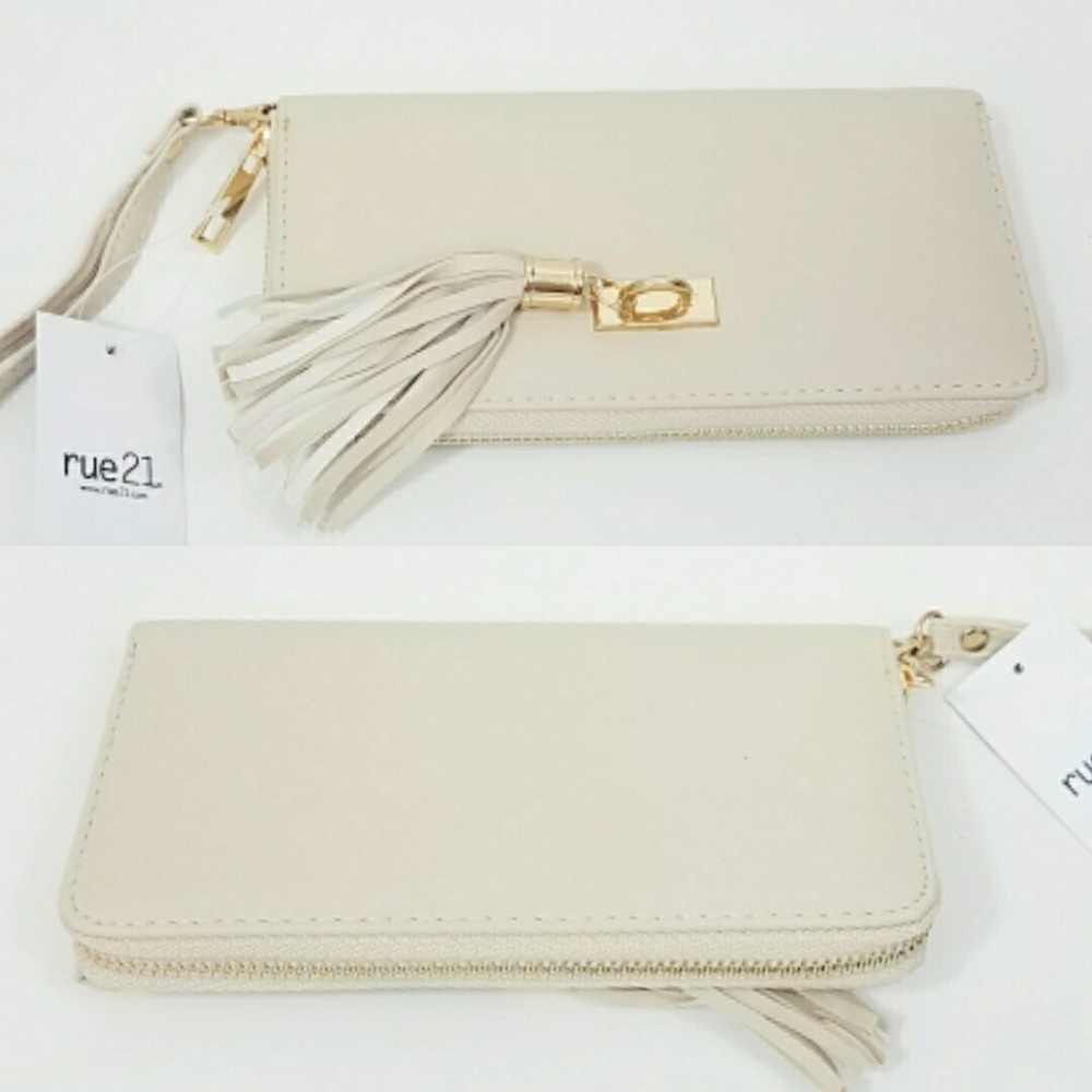 Cream wristlet wallet with tassel