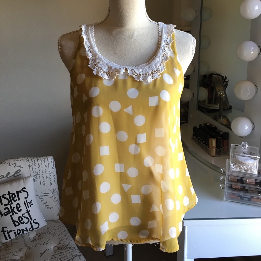 Fun flirty and flows Top with cute lace & pattern