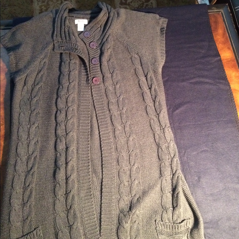 Grey cabled sweater vest. Very long, with pockets
