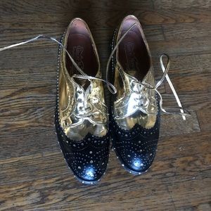 Gold/black Jeffrey Campbell’s Oxford like