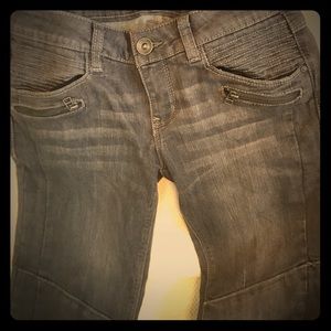 Biker jeans, gray distressed.