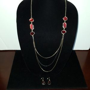 Long gold tone and red stone necklace and earring