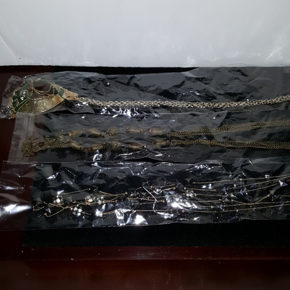 3 necklace and earring sets