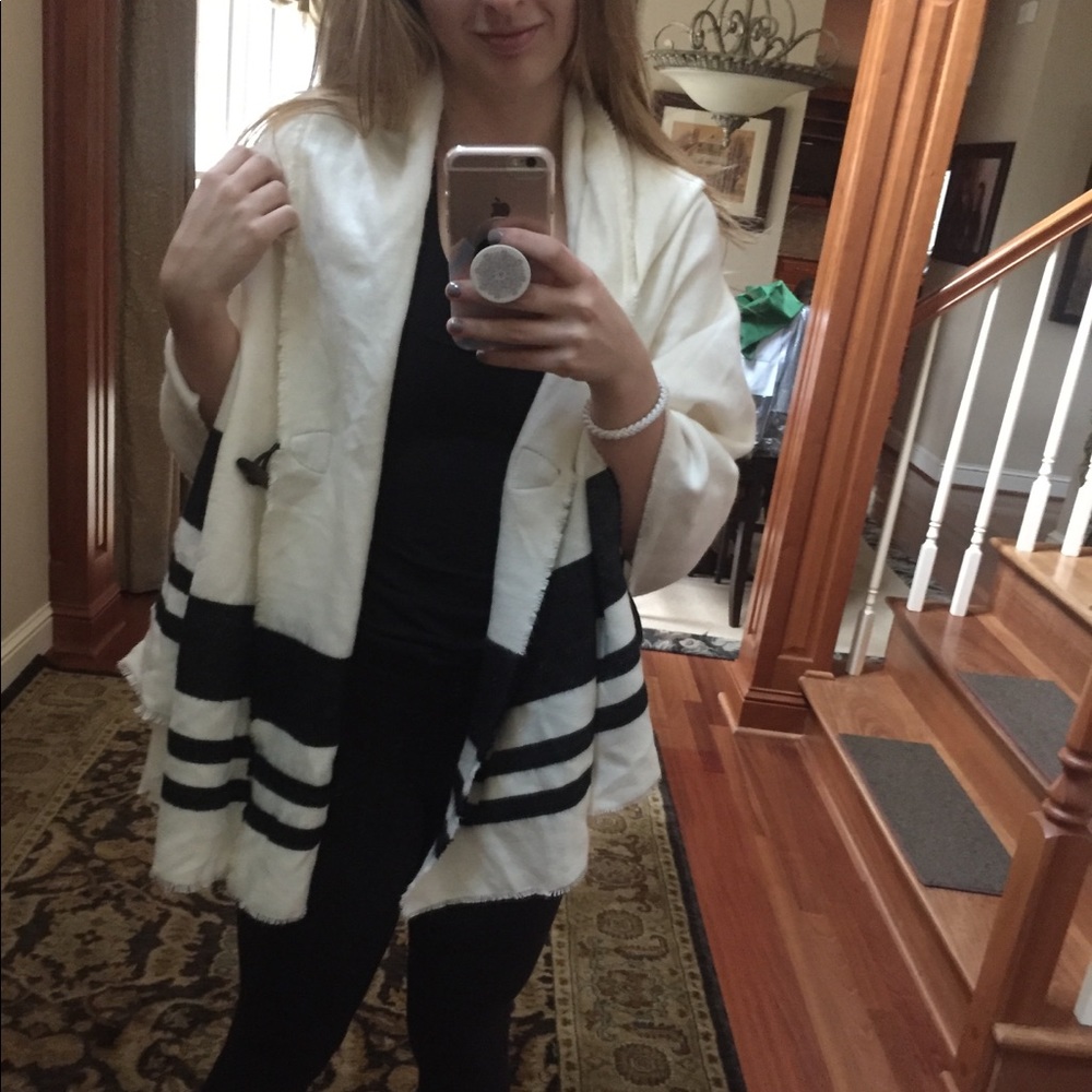 Black and white striped poncho