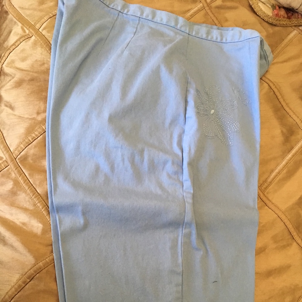 Light blue pants with embroidered white flower. Just in time for SPRING!
