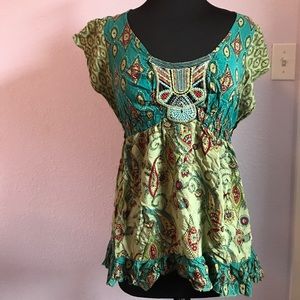 Pretty green paisley top. 100% rayon.