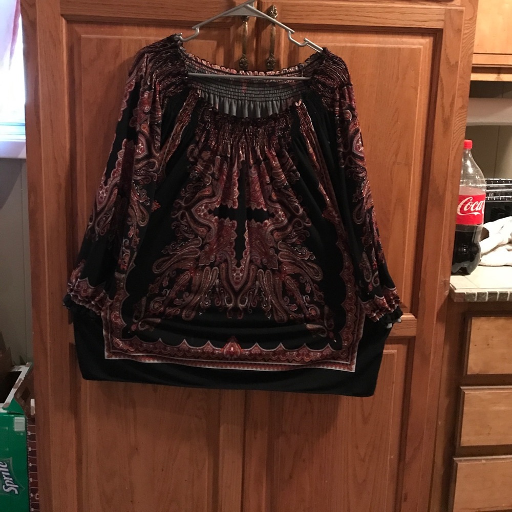 Soft flowing long sleeved top.