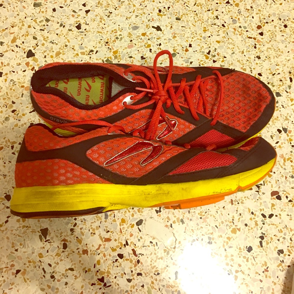 Mens Newton running shoes. Red black and yellow
