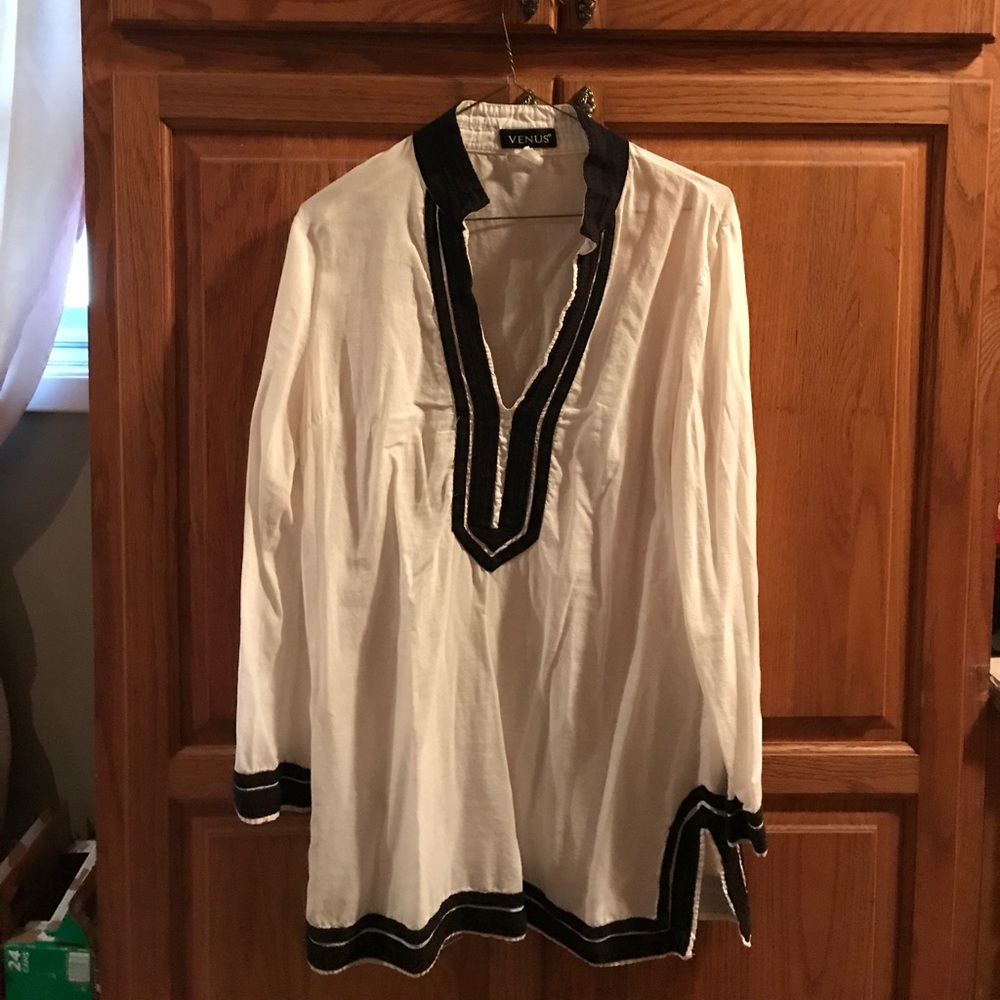 Tunic but perfect for swimsuit cover up.