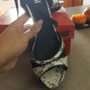 Nomi snakeskin heels