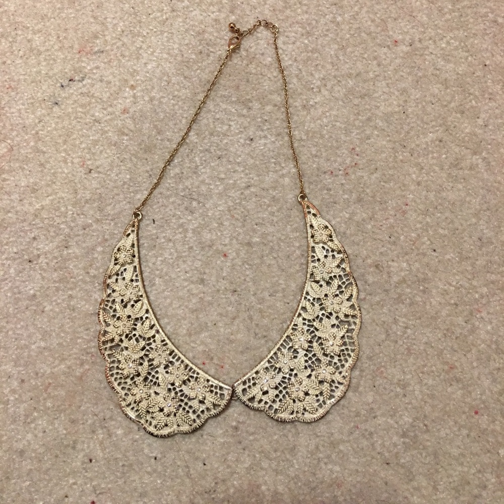 White &a gold collar necklace
