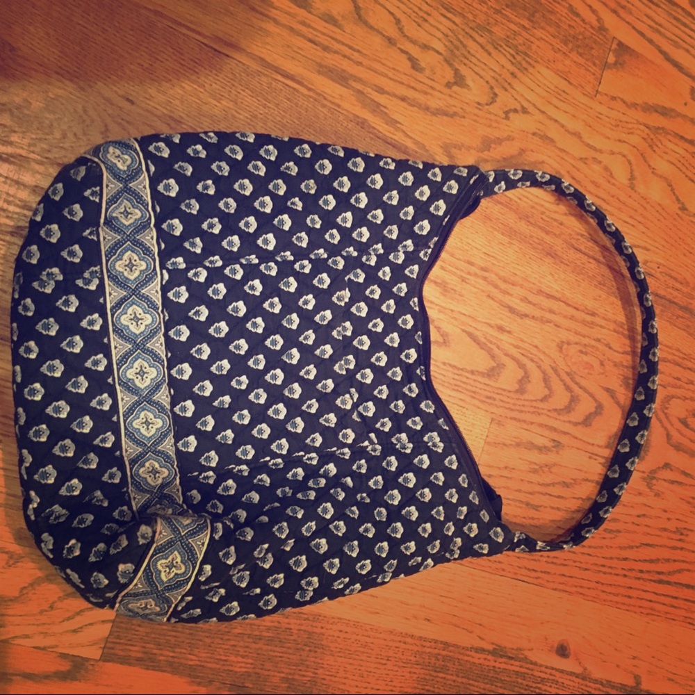 Vera Bradley purse with a vintage pattern.