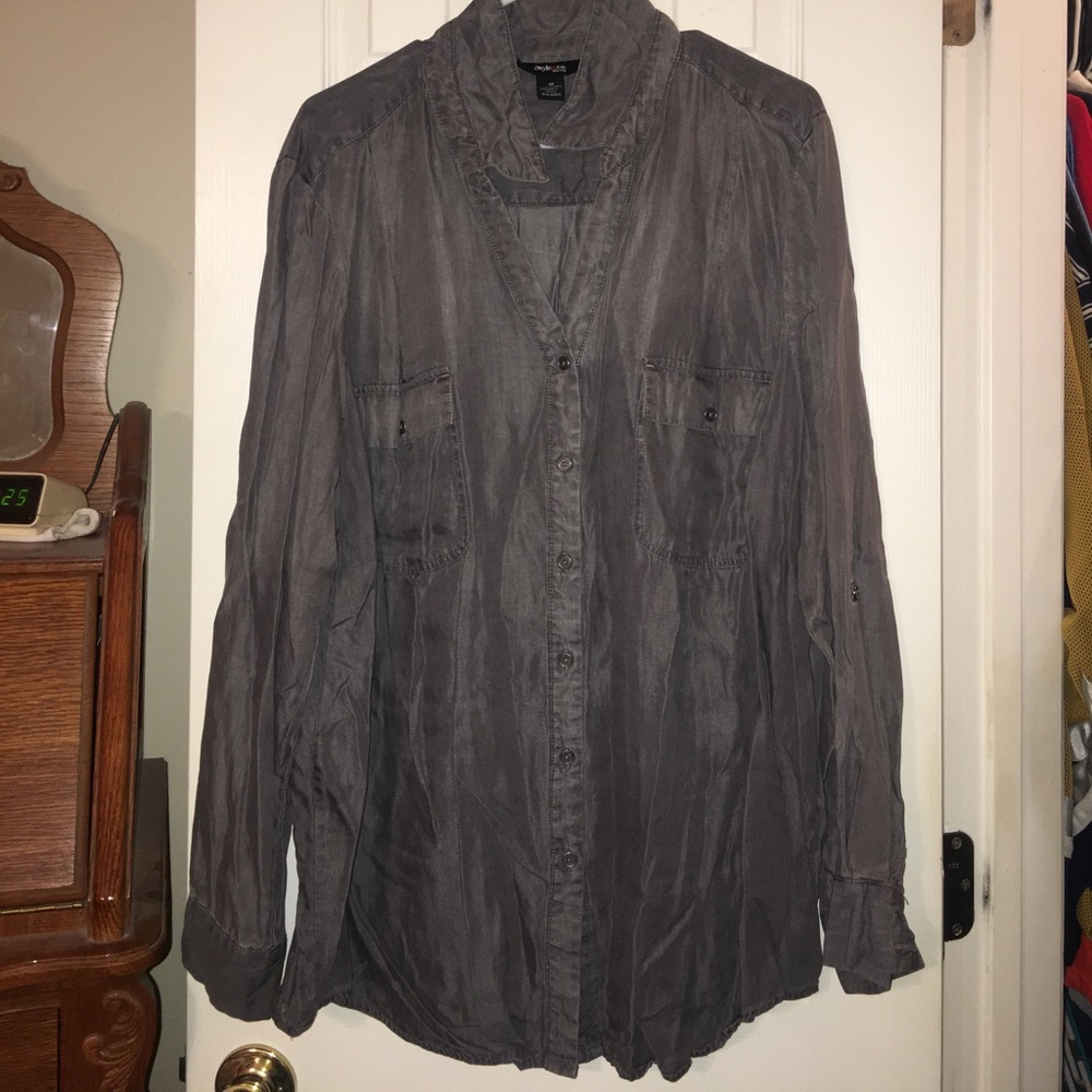 Grey long sleeved button up shirt