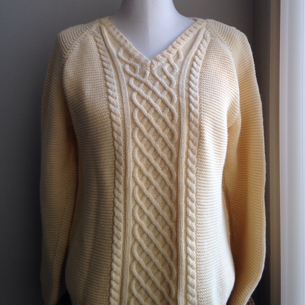 Cream IZOD V-neck knit-sweater.