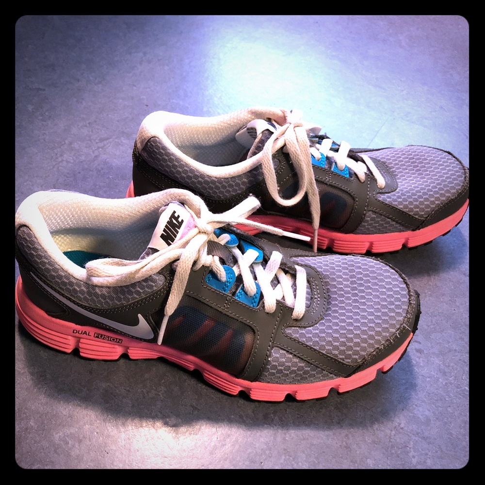 Nike youth size 5.5 equivalent to women’s size 7.