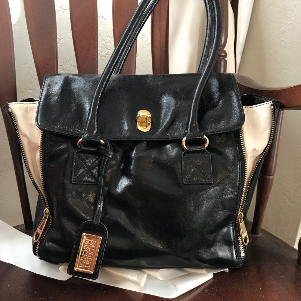 Badgley Mischka black leather bag with zip inserts