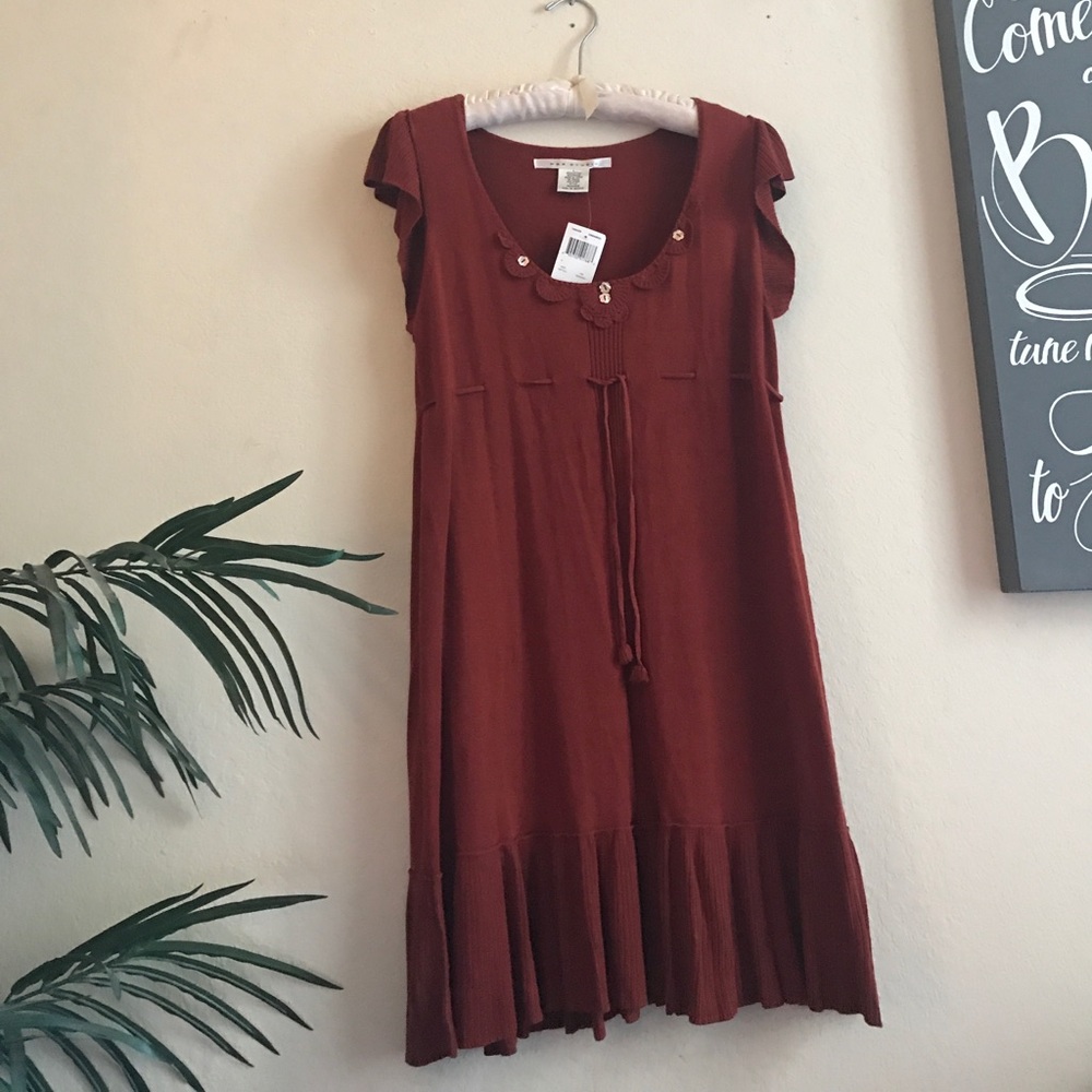 Burnt orange knit dress with flower neck detail
