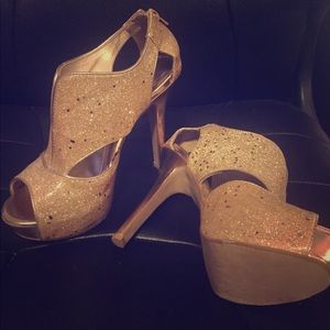 Gold glitter high heels