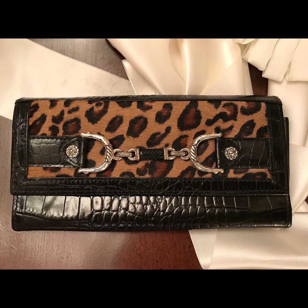 Brighton wallet with faux cheetah fur. Never used