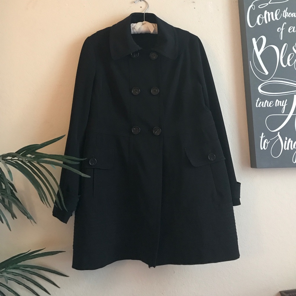 Black trench rain coat.