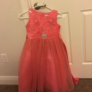 Coral sparkle pageant dress.